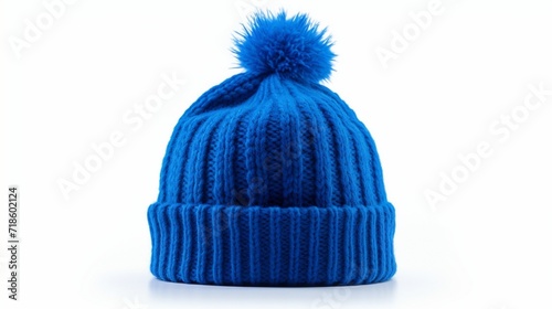 Blue bobble hat isolated against a white background