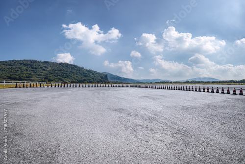 Empty asphalt road and mountains with nature background