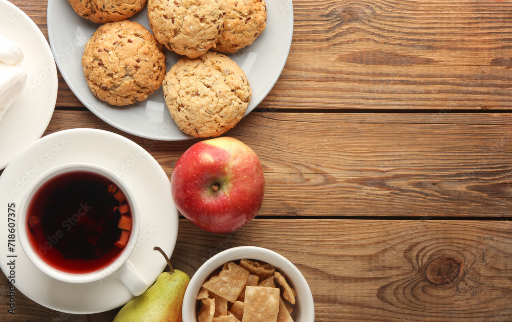 cereal cookies with Cup of tea and fruits on the table cereal cookies with Cup of tea and fruits on the table