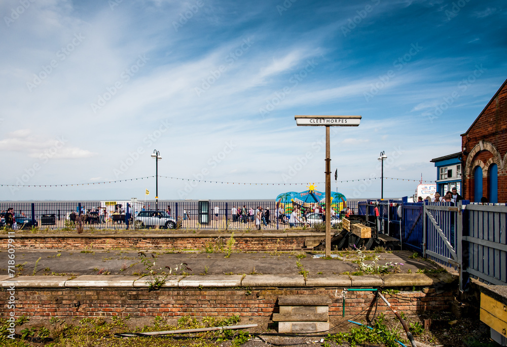 Cleethorpes railway station sign looking across the sea front on a sunny summer day at Cleethorpes, North East Lincolnshire, UK. Cleethorpes railway station sign looking across the sea front on a sunny summer day at Cleethorpes, North East Lincolnshire, UK.