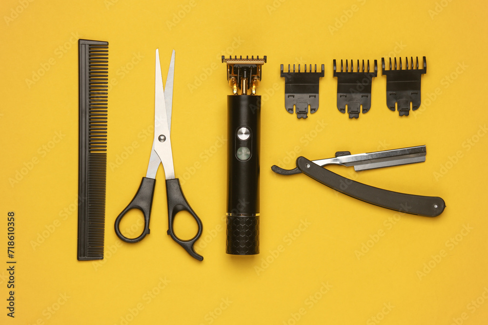 Barber working tools on a yellow background. Layout. Flat lay. Top view Barber working tools on a yellow background. Layout. Flat lay. Top view