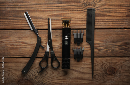 Barber working tools on wooden background. Layout. Flat lay. Top view