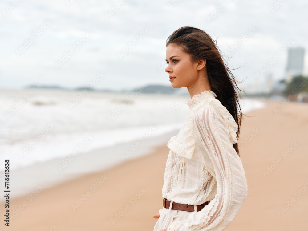 Beauty of Summer: Attractive Young Woman Standing on White Sandy Beach, Enjoying Sunny Vacation by the Blue Ocean Beauty of Summer: Attractive Young Woman Standing on White Sandy Beach, Enjoying Sunny Vacation by the Blue Ocean