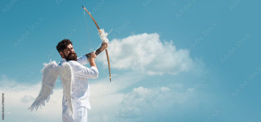 Surprised cupid with wings aiming with bow and arrow on a sky background. Funny valentines day concept. Humor comical concept. Surprised cupid with wings aiming with bow and arrow on a sky background. Funny valentines day concept. Humor comical concept.
