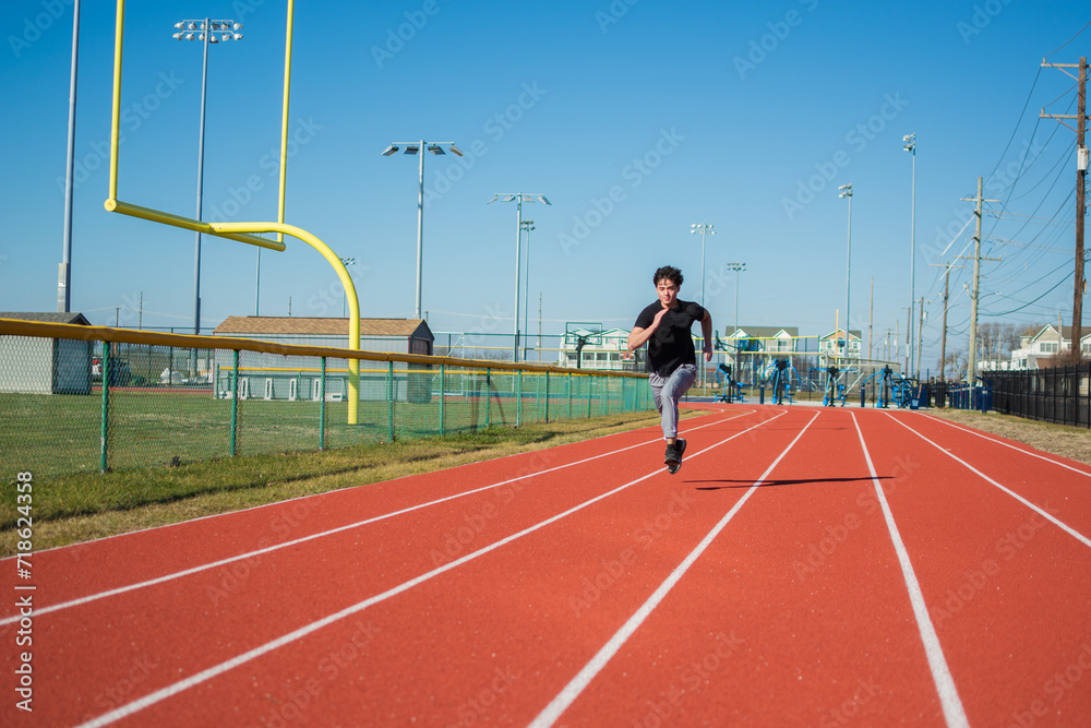 Fototapeta premium Young asian guy running