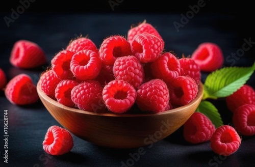Fresh raspberries on a dark background