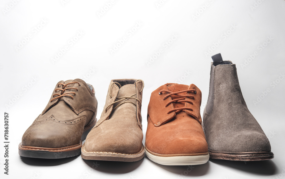 Various men's shoes on a white background Various men's shoes on a white background