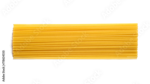 Raw spaghetti pasta isolated on white background. Long pasta top view.