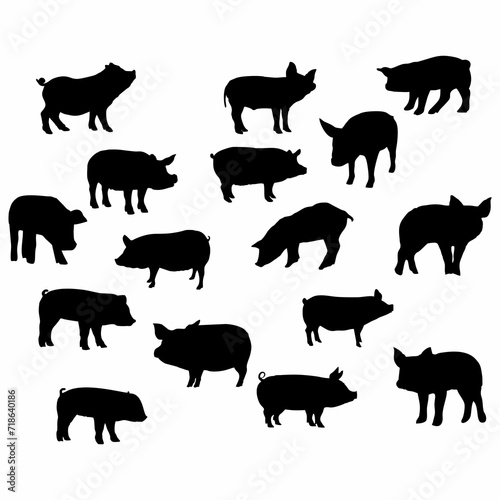 silhouette of a black pig walking photo