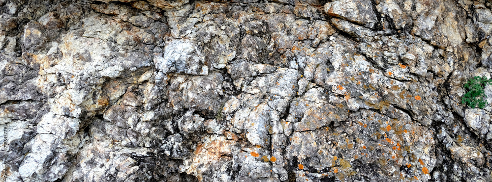 Rough mountain surface. Close-up. Empty space. Rough mountain surface with cracks. Basalt Rough mountain surface. Close-up. Empty space. Rough mountain surface with cracks. Basalt