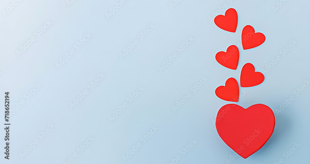 Paper hearts on blue background. Valentine's day concept.