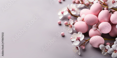Easter eggs with spring flowers on the branches . Colored Egg .Easter banner. Сopy space for text.Top view, flat lay