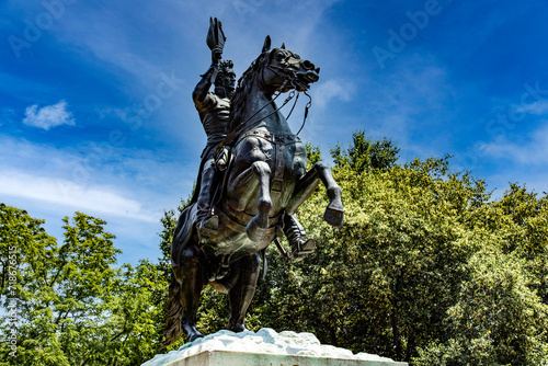 Statue and monument of Andrew Jackson on horseback in Lafayette Square in front of the White House and Obelisk in Washington DC  USA.
