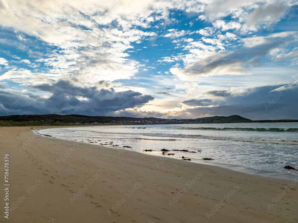 Beautiful cumulus clouds above Narin Strand, a beautiful large blue flag beach in Portnoo, County Donegal - Ireland.