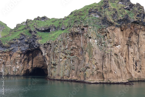 Steep cliff on the coast of Heimaey island- Vestmannaeyjar- Westman Islands-Iceland 