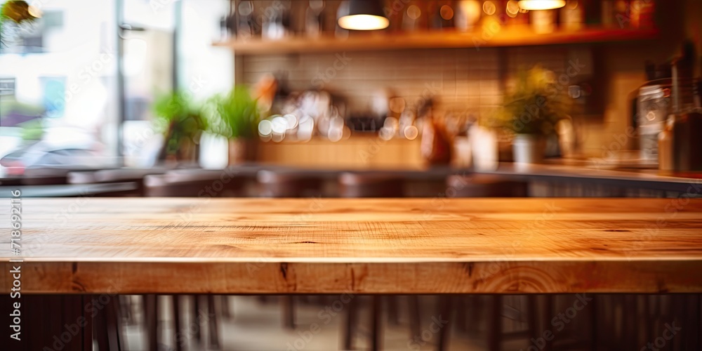 Blurred brown table in restaurant kitchen interior.