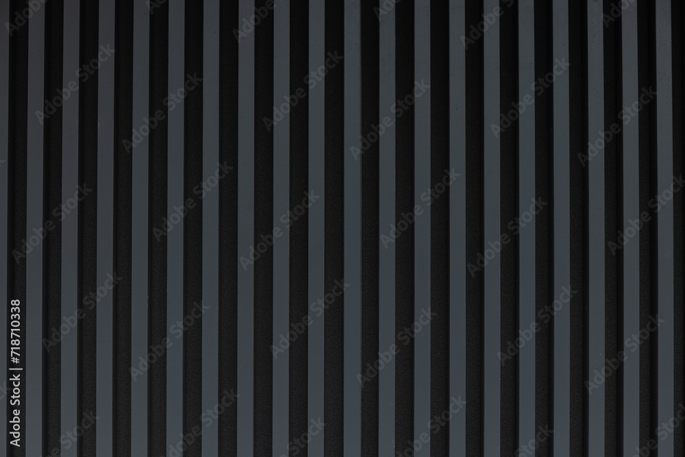 Dark gray striped background, wall on the street. Dark gray striped background, wall on the street.