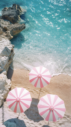 white pink striped beach umbrellas top view