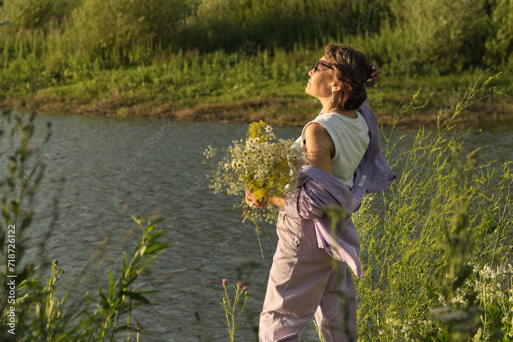 older woman enjoys the peace and beauty of nature, highlighting the wisdom and experience gained over the years older woman enjoys the peace and beauty of nature, highlighting the wisdom and experience gained over the years