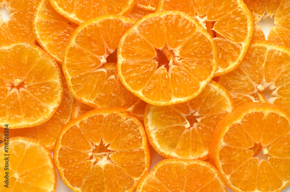 juicy and appetizing tangerines cut into circles as a food background 4 juicy and appetizing tangerines cut into circles as a food background 4