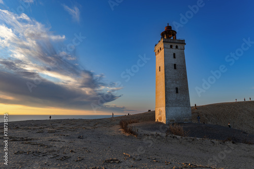Sunset at the lighthouse Rubjerg Knude Fyr near Lokken in Denmark.