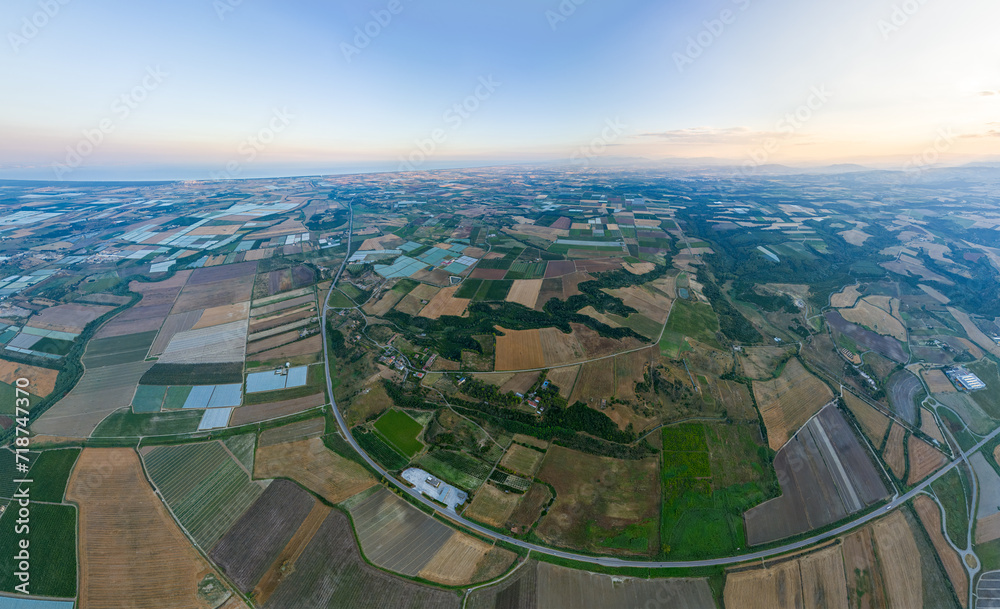 Ginosa, Italy. Geometric pattern of agricultural fields. Sunset time. Aerial view