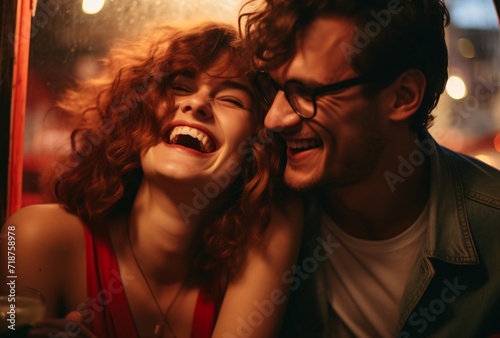 a girl and a man laughing together