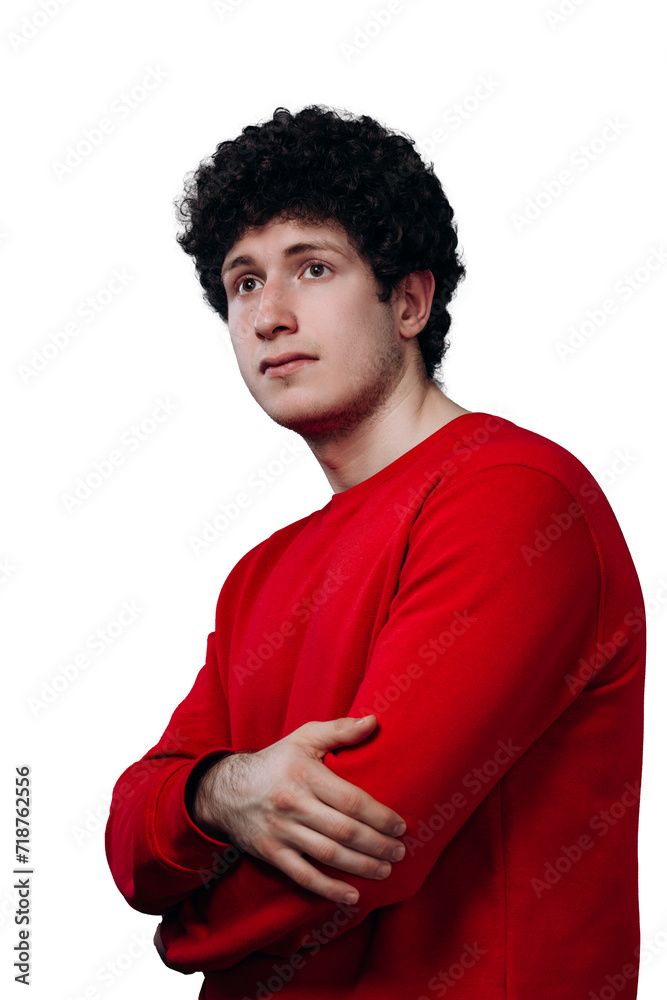 Portrait of a calm serious guy standing without emotions on a white background and looking at the camera without interest. Portrait of a calm serious guy standing without emotions on a white background and looking at the camera without interest.