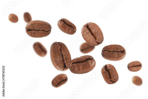 Coffee beans in the air close -up isolated on white background.