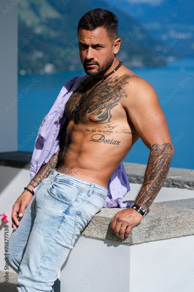 Sexy man posing outdoor on nature background. Man sexy. Handsome naked