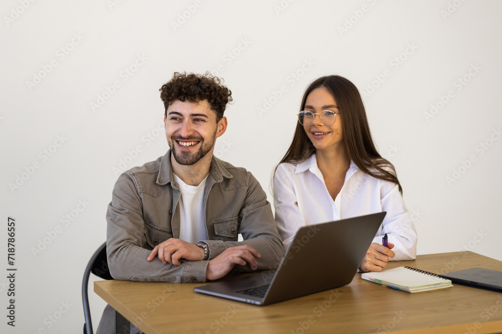 Portrait of successful smiling business owners at cozy office. Portrait of successful smiling business owners at cozy office.