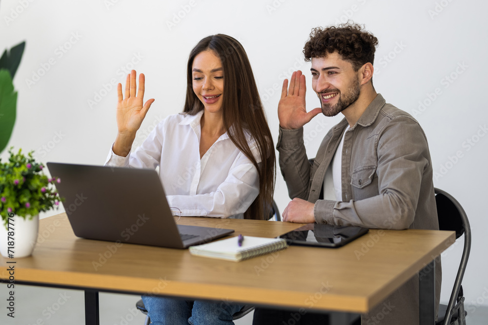 Young business couple have video call in office Young business couple have video call in office