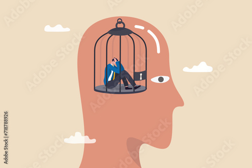 Struggle prison mind, fixed mindset trapped inside psychology, stressed anxiety or overworked, slavery, despair prisoner or depression concept, businessman trapped inside birdcage on human head brain.