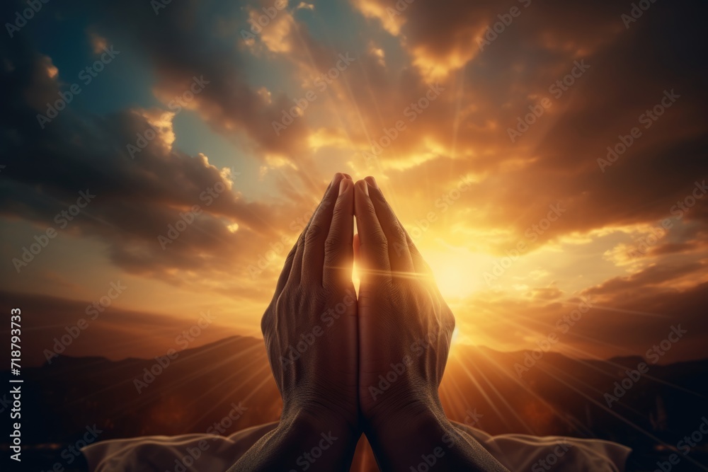 Raised hands in worship to sunset sky. Christian faith concept. - obrazy, fototapety, plakaty 