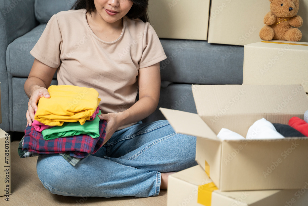 Pack your checked clothes in cardboard boxes for the move. Pack your checked clothes in cardboard boxes for the move.