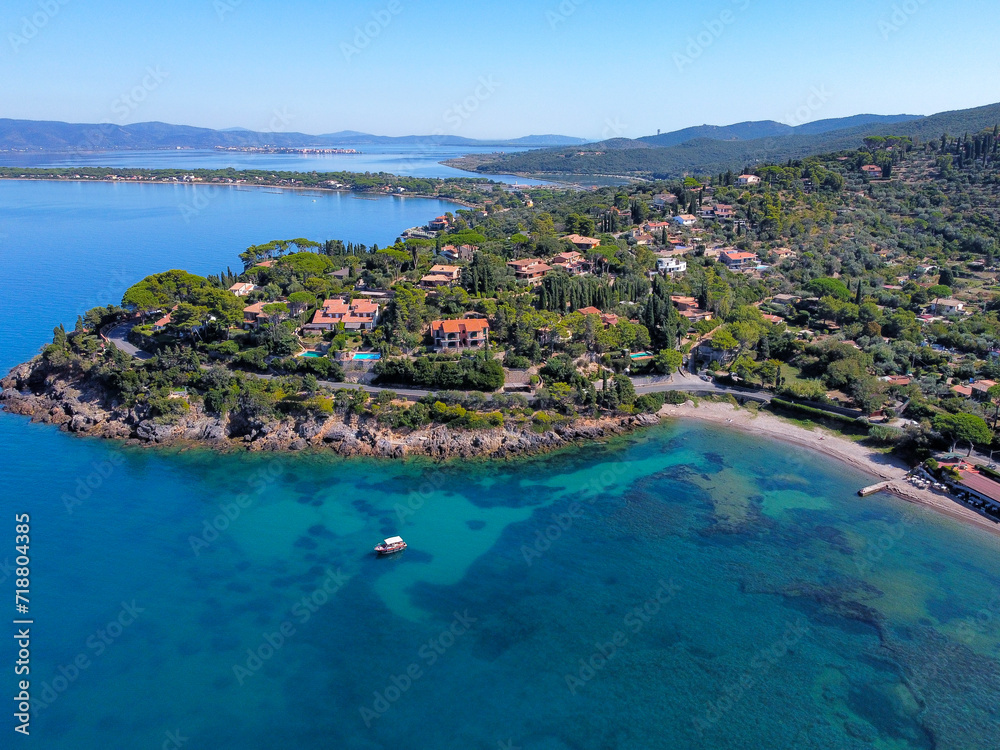 aerial view of the Argentario coast, in the background the Orbetello lagoon.