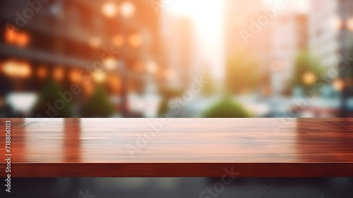 Photo of empty wooden table and restaurant sign inside blurry glass window. Abstract background mockup   wallpaper and background.