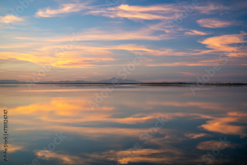 End of the day on a lake  sunset and light in the clouds- Tunisia