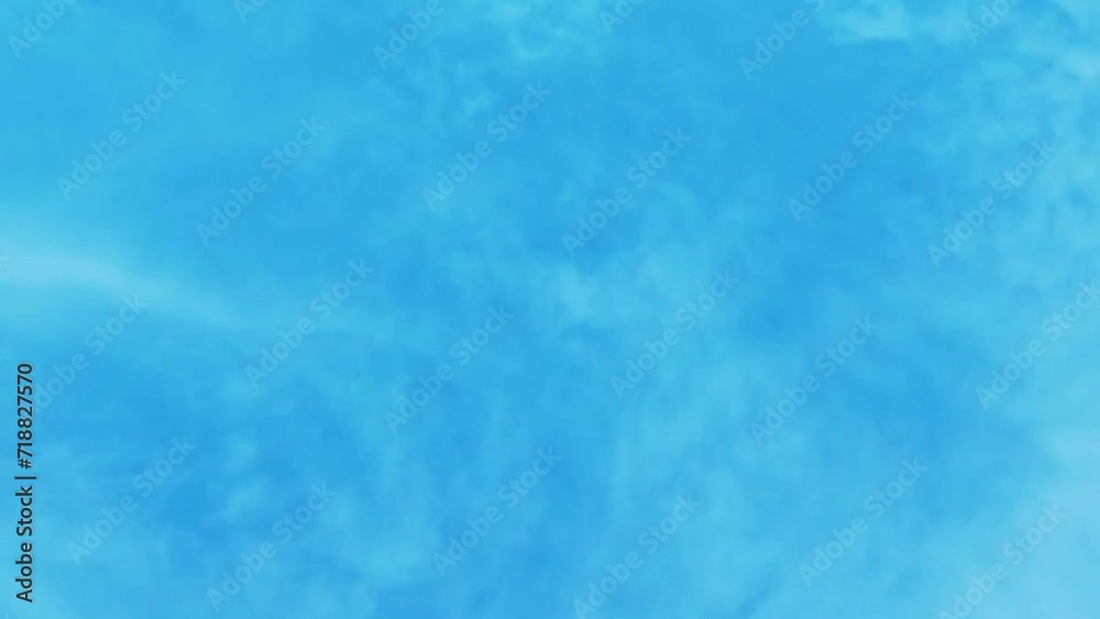 Flying White Cirrus and Cumulus Clouds in Azure Sky Time Lapse. Aerial View Airplane Window, Aerial Drone View Blue Sky and White Clouds, Blue Cloud Skyscraper, Atmosphere, Day, Background, Heaven. Flying White Cirrus and Cumulus Clouds in Azure Sky Time Lapse. Aerial View Airplane Window, Aerial Drone View Blue Sky and White Clouds, Blue Cloud Skyscraper, Atmosphere, Day, Background, Heaven.