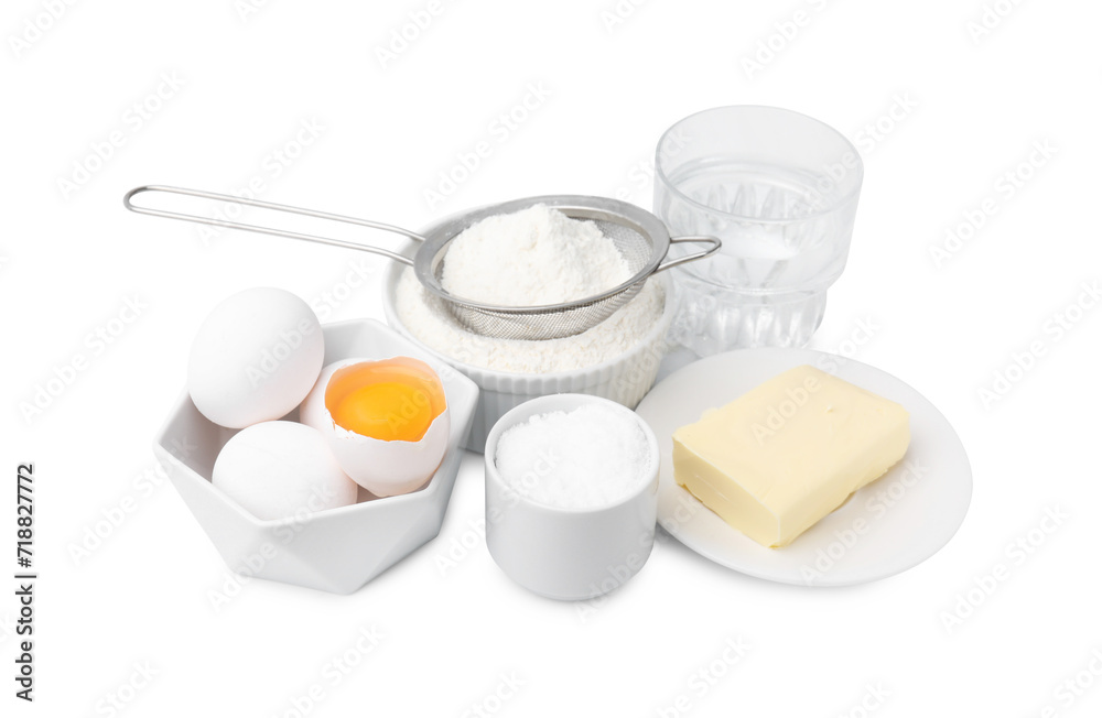 Eggs, butter, flour, salt and water isolated on white. Ingredients for puff pastry dough Eggs, butter, flour, salt and water isolated on white. Ingredients for puff pastry dough