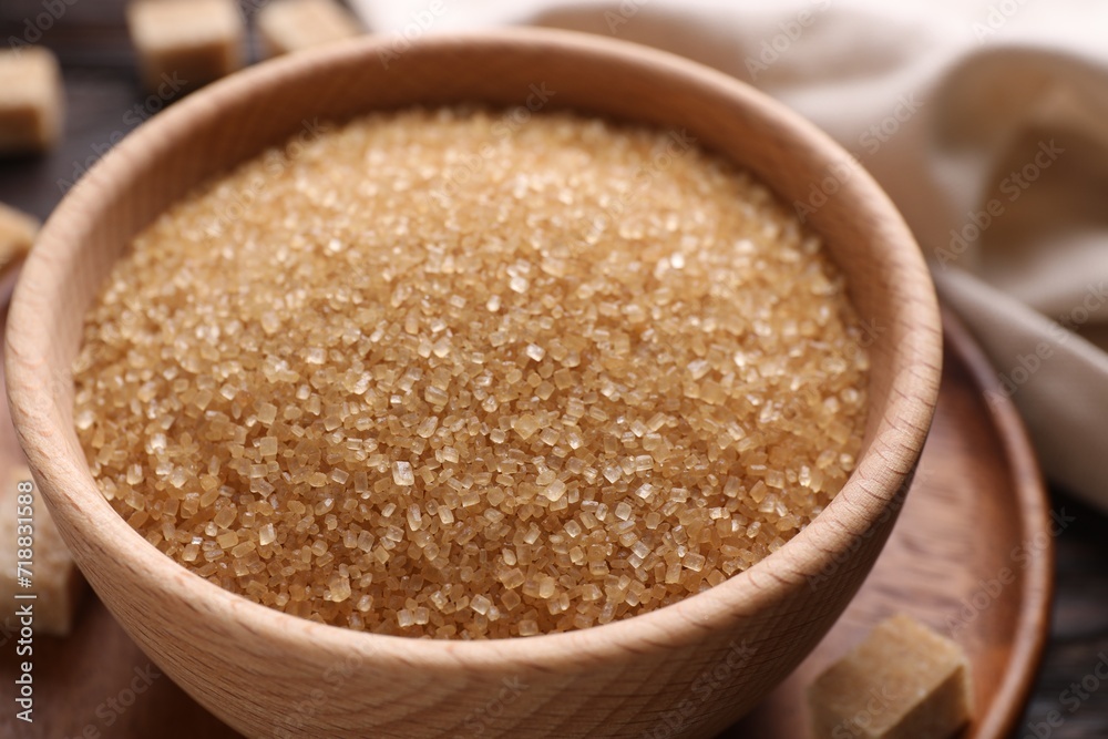 Brown sugar in bowl on table, closeup Brown sugar in bowl on table, closeup