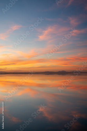 End of the day on a lake, sunset and light in the clouds- Tunisia © skazar
