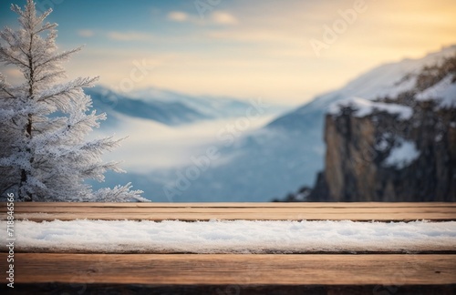 Emmpty wooden table background at top cliff and rock with snowflake
