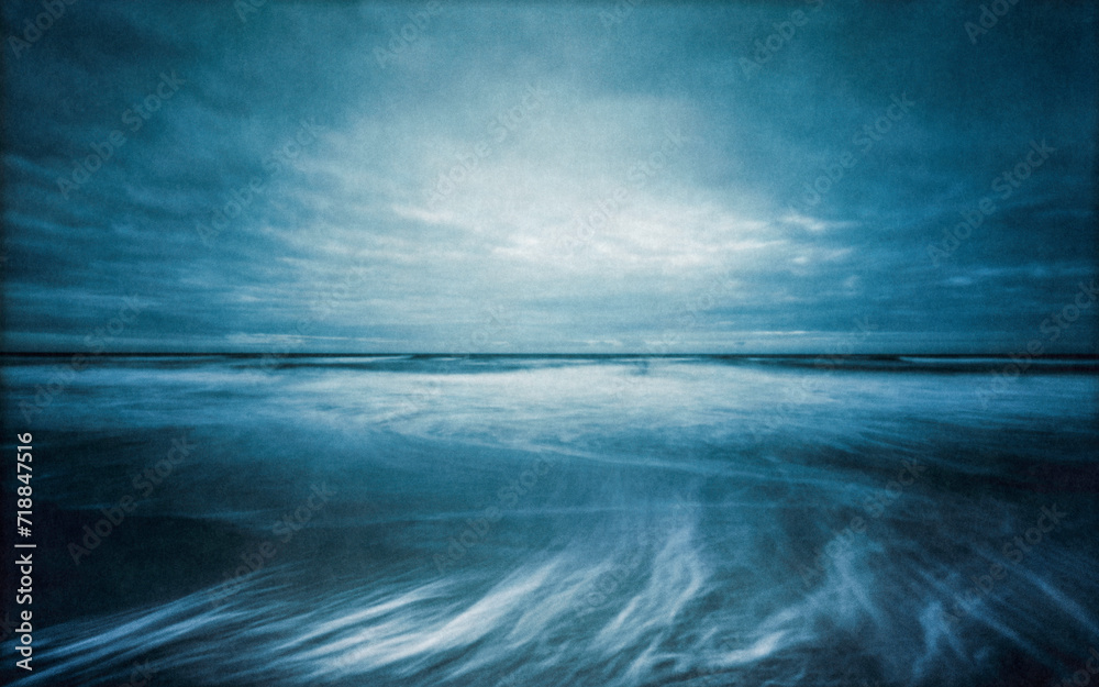 The North Sea photographed with a wooden pinhole camera, captured analogue on film. The small aperture  makes for long exposure times in which sand, sea, water, sky and clouds mix with t