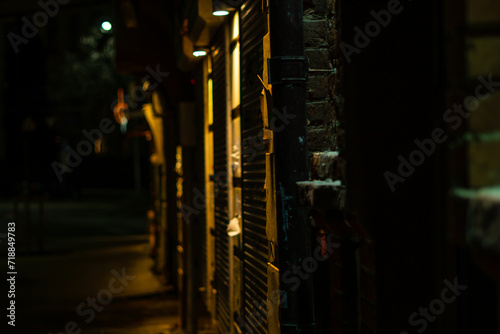 Dark and eerie urban city alley at night