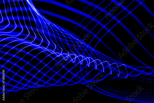 Illustration or 3D rendering. Abstract lines forming a three-dimensional framework on a black background.