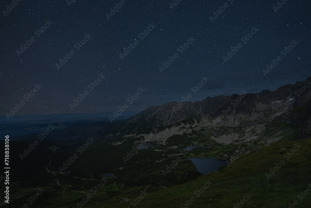 Night scene in the Polish Tatra Mountains, view from the Beskydy mountain to the lake.