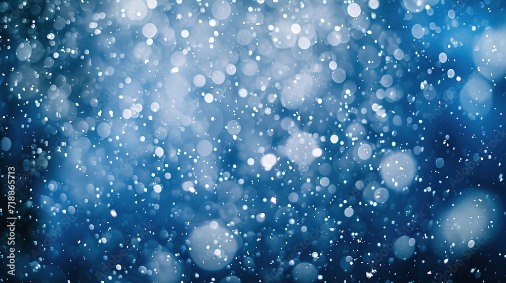 Obraz premium Falling snowflakes on night sky white background. Bokeh with white snow and snowflakes on a blue background