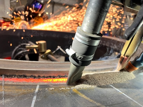 Submerged arc welding. Concept of robotized and automated welding.