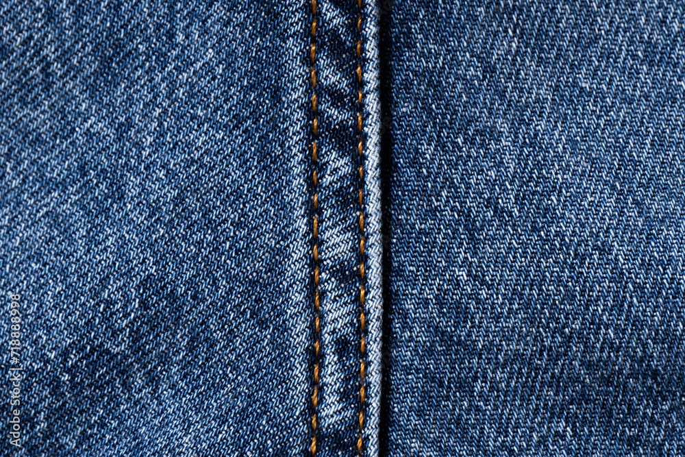 Texture of denim, cotton. Blue textile background. Texture of denim, cotton. Blue textile background.